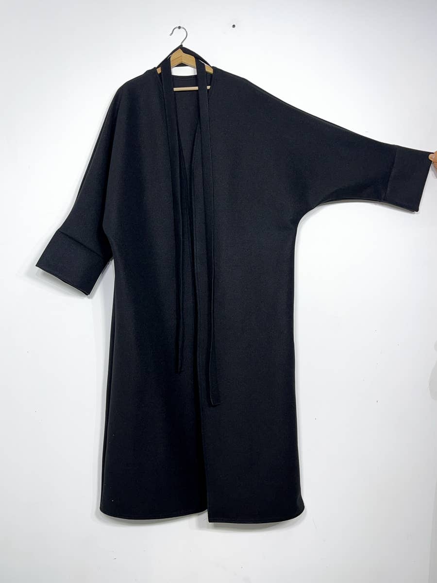 Abrigo Modesto – Elegancia y Calidez
